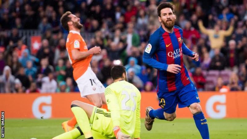 Lionel Messi scored twice as Barcelona retained their La Liga lead with a thumping win to relegate Osasuna. Lionel Messi scored twice as Barcelona retained their La Liga lead with a thumping win to relegate Osasuna.